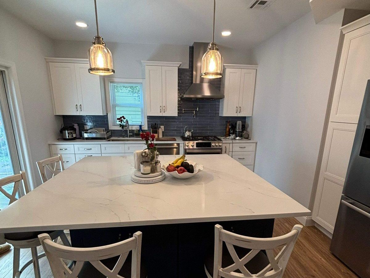 Open concept living space renovation on Long Island by Best In Class Renovations