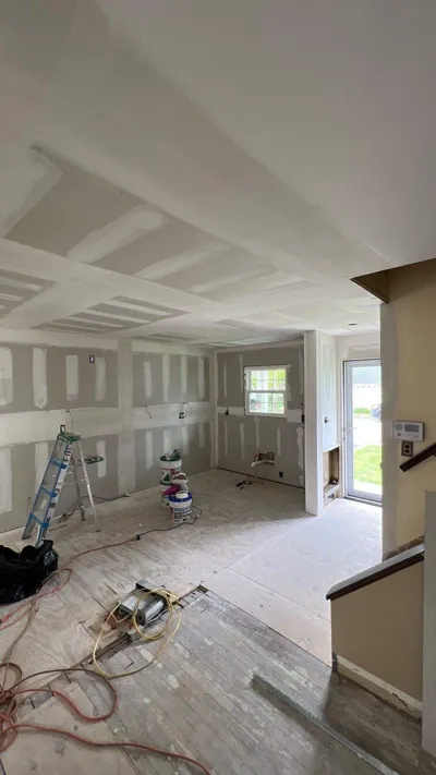 Long Island home addition in progress with new drywall and framing by Best In Class Renovations